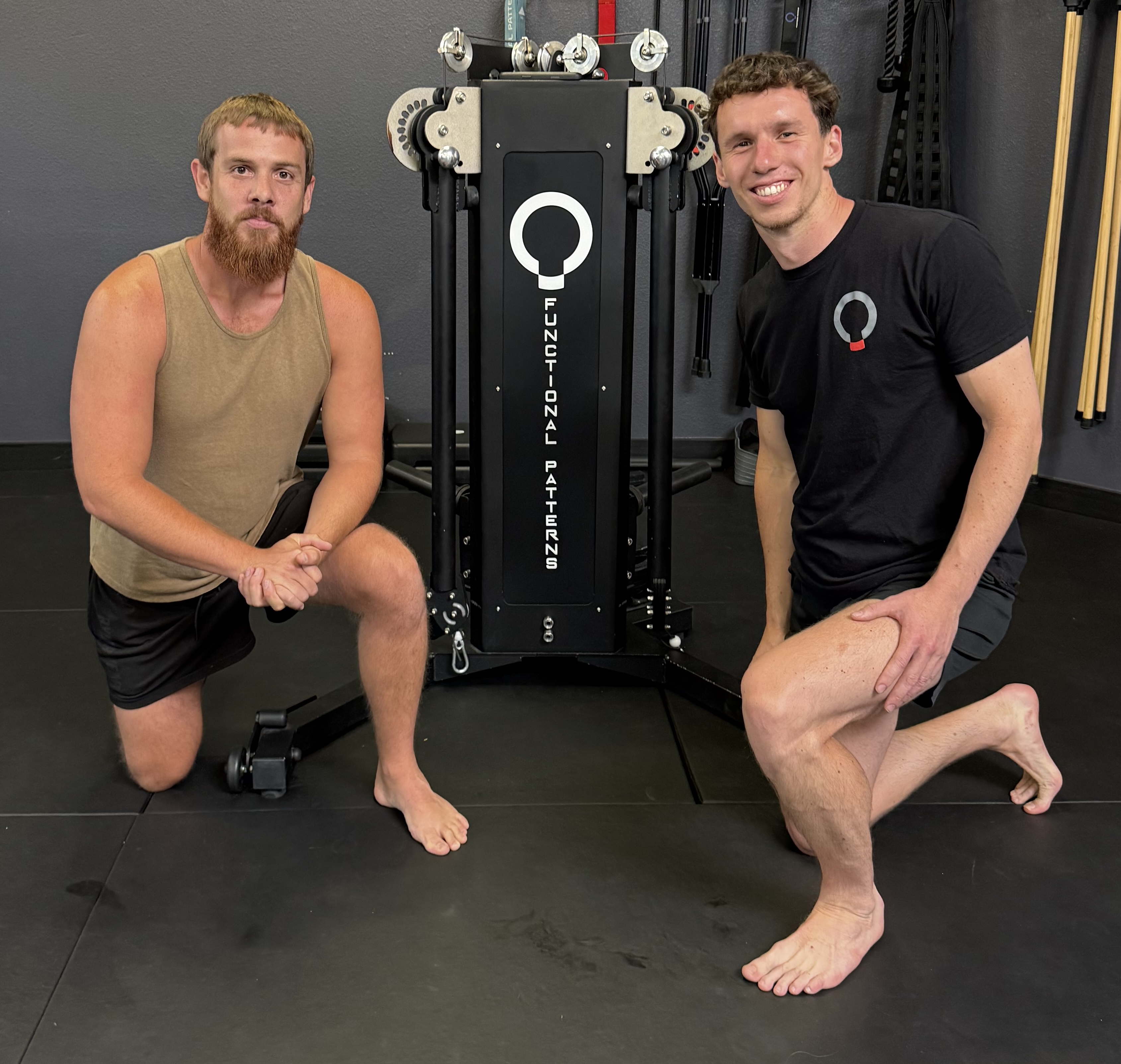 Michael Vincent alongside Functional Patterns instructor John Marshall Nielson at an FP training rig